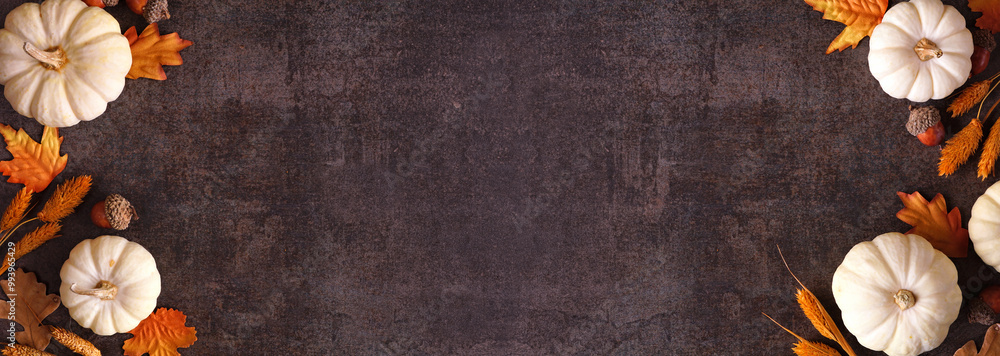 Poster fall double border of white pumpkins with muted orange and brown autumn decor. above view on a rusti