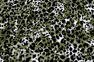 Green, white and black spotted fabric flat lay pattern