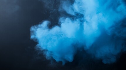 blue abstract paint bomb on dark black background 