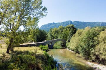 Amazing scenery by the river near Ziakas old stone bridge, Grevena, Greece