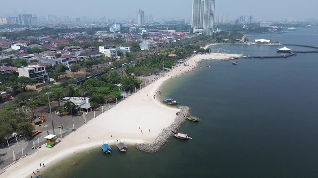 A beautiful white beachfront view of Ancol Jakarta, traveling, vacation, theme park