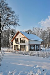 Winter Passive House in Snowy Setting Showcasing Sustainable Warm Interior Climate
