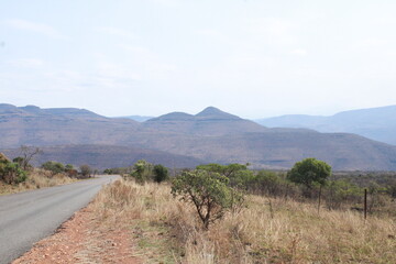 road with mountain in the background