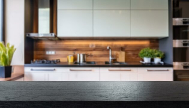 black countertop on the blur of a modern kitchen interior. Empty tabletop in bright color with wood texture. Food product mockup design. modern kitchen interior. modern kitchen in house