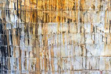 A view of the marble quarry walls in Vila Viçosa, Alentejo, showcasing multiple layers and levels...