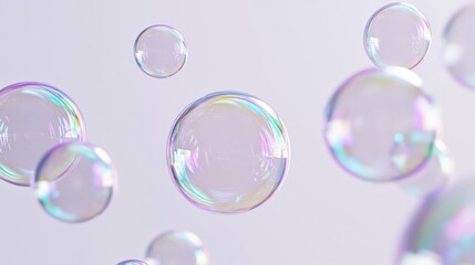 Beautiful soap bubbles floating against a soft, light background, creating a whimsical and dreamy atmosphere. High-quality stock photo.