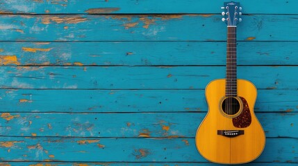 Obraz premium Wooden acoustic guitar resting on a bright blue wooden wall background, symbolizing a blend of art and simplicity.