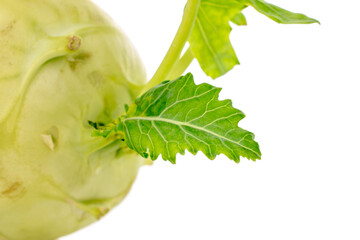 One ripe kohlrabi, macro, isolated on white background.