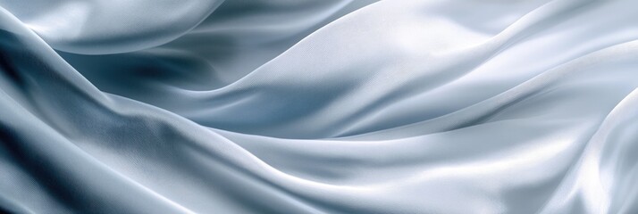 Obraz premium Rippling silk fabric texture in motion, with soft shadows and flowing curves