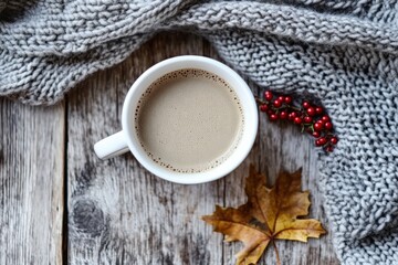 White Mug with Coffee and Cozy Autumn Decor on Wooden Surface