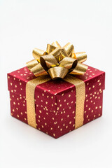 Obraz premium Red gift box wrapped with gold bow and ribbon isolated on white background