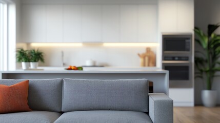Fototapeta premium Cozy living room featuring a modern sofa, bright kitchen, and inviting atmosphere, perfect for home decor inspiration.