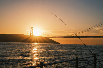 [HYOGO]Sunset view of Akashi Kaikyo Bridge, known as one of the world's largest suspension bridges,...