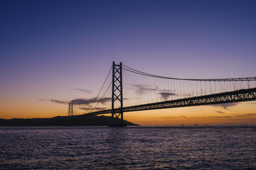 [HYOGO]Sunset view of Akashi Kaikyo Bridge, known as one of the world's largest suspension bridges, A bridge with a beautiful contrast against the evening sky, Azur Maiko, Japan