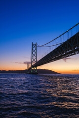 [HYOGO]Sunset view of Akashi Kaikyo Bridge, known as one of the world's largest suspension bridges, A bridge with a beautiful contrast against the evening sky, Azur Maiko, Japan