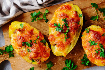 Baked Potatoes Stuffed with Mushrooms and Cheese.selective focus