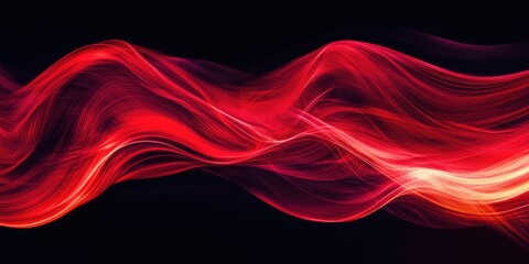 Luminous red hues contrasting against a black background for creative design purposes