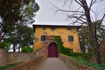 Fototapeta premium view of the ancient Aiola Castle dating back to the 13th century and located near Vagliagli, Siena, Italy