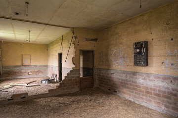 Abandoned empty room in a military barracks.