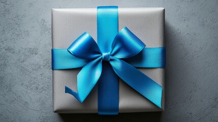 Vibrant Blue Ribbon on Gray Gift - Contrast of Color in Monochrome Scene