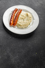 Mashed potatoe and fried sausage food simple dish fresh delicious gourmet food background on the table rustic food top view copy space