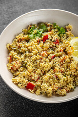tabbouleh vegetable bulgur couscous dish fresh delicious vegetarian and vegan food gourmet food background on the table rustic food top view copy space