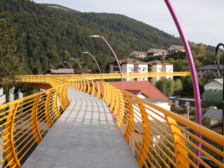 Sinaia, Romania - September 25th 2024 - Vibrant Yellow Pedestrian Bridge Connecting Neighbourhoods.