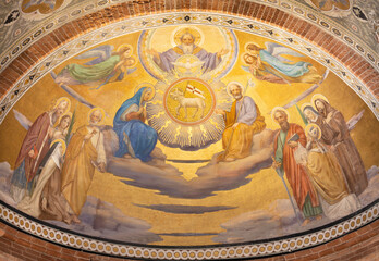 PAVIA, ITALY - SEPTEMBER 9, 2024: The fresco of Holy Trinity among the saints in the main apse of church Chiesa di San Teodoro.