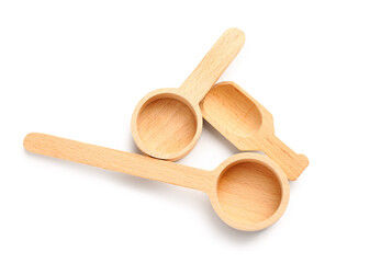 Set of wooden scoops isolated on white background