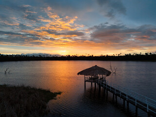Obraz premium Breathtaking Aerial View of a Charming Cabana at Sunset, Sri Lanka – A Slice of Tropical Paradise
