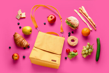 Lunch box bag with different tasty food on pink background