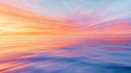Fototapeta premium A vibrant sunrise sky blends with a tranquil ocean, creating a serene dance of light and water.