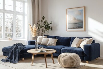 A stylish living room featuring a navy blue sofa, wooden coffee table, and knitted ottomans, illuminated by natural light through a large window in a minimalist Scandinavian home