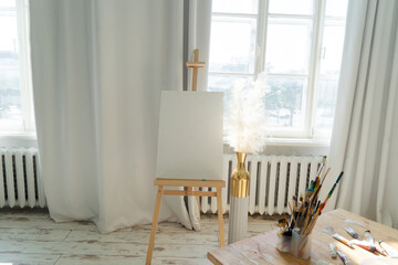 A Bright and Innovative Art Studio Featuring Beautiful Wooden Furniture along with Captivating Paintings