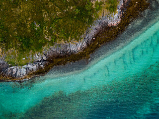 Turqoise water in Arctic Norway - the shore of Tengeljord