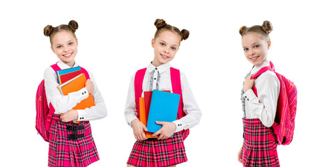 Fototapeta premium Happy cute child girl in school uniform holding books.