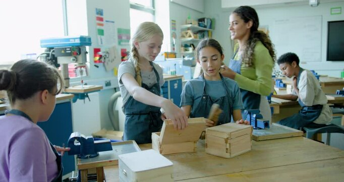 Group of Female Students in Woodworking Class working on Craft Project