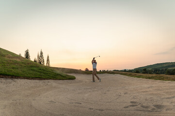 fairway, golf, golf course, golfer, marathon, run, runner, tee, course, training. A man is playing...