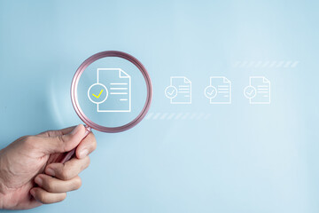 compliance, contract, document, management, marketing, touch, information, social, corporate, network. A hand holding a magnifying glass with a check mark on it.