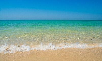 Obraz premium Beautiful horizon landscape summer season panorama front view point tropical sea beach white sand clean and blue sky background calm nature ocean wave water travel at Sai Kaew Beach thailand holiday