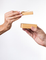 woman holding a gift box in her hand and untie a bow
