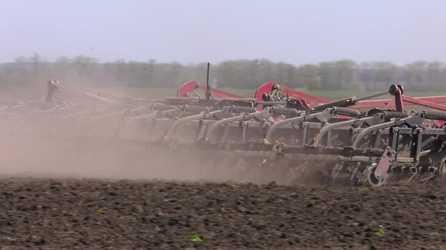 View of tractor, combine plowing cultivating agriculture field