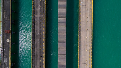 Aerial view of bridge road over lake or sea