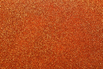 Shiny orange glitter texture background