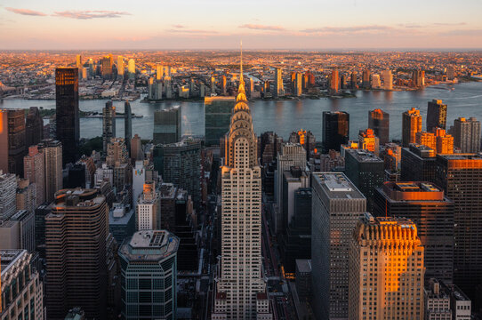 Aerial view of Manhattan NYC at sunset highlighting iconic buildings