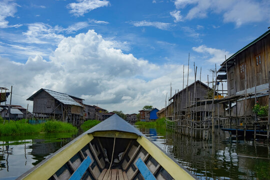 Scenic view of Inle Lake stilt houses from a boat