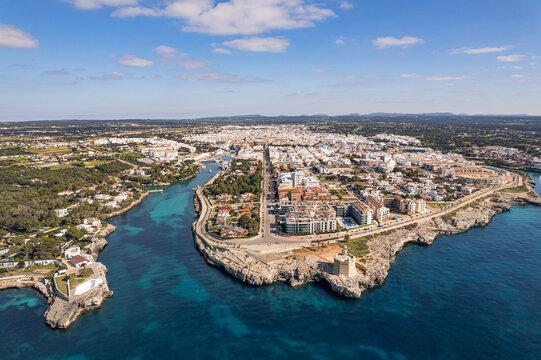 Aerial views of Ciutadella, Menorca, Port and cityscape across times of day