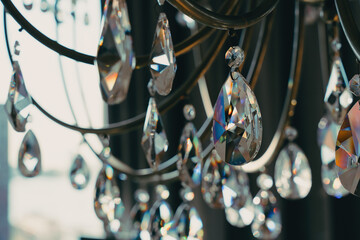 Crystal Drops Hanging From A Golden Chandelier