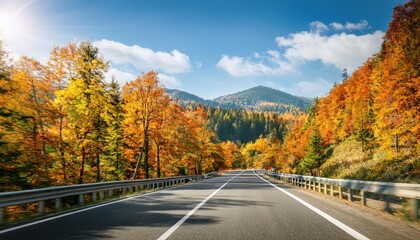 Obraz premium car drive on autumn road in beautiful nature. autumn colors in beautiful mountain road 