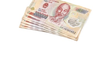 Vietnamese money 200,000 Dong on white background. VND banknotes or Vietnamese Dong is the national currency of Vietnam.